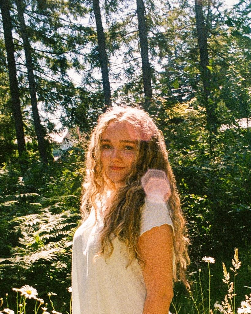 Sunlit portrait of Carly in the woods